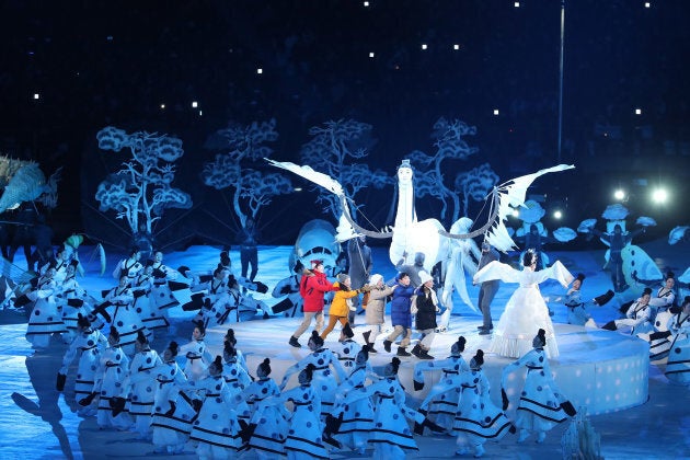 Children are led through a wonderland during the opening ceremony at the 2018 Winter Olympics at PyeongChang Olympic Stadium.