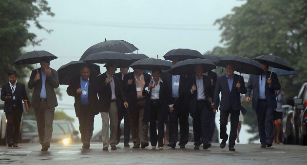 Canada's provincial premiers walk to a morning meeting during their Council of the Federation summit in Charlottetown, Prince Edward Island, on Aug. 28, 2014.