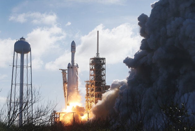 The SpaceX Falcon Heavy rocket lifts off from launch pad 39A at Kennedy Space Center on Feb. 6, 2018 in Cape Canaveral, Fla.