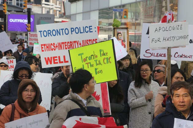 Asian Canadians protested in Toronto, Ont., on Jan. 29, 2018, to demand apologies following the revelation that an 11-year-old Muslim girl's story that an Asian man had cut her hijab while she walked to school was untrue.