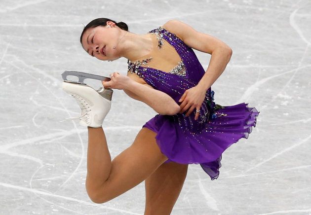 Japan's Akiko Suzuki competes during the women's short program at the ISU World Figure Skating Championships in Saitama, north of Tokyo March 27, 2014.