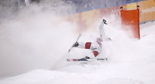 Canadian moguls skiier Philippe Marquis crashes during the Men's Freestyle Skiing Moguls Final 1 at the Bokwang Phoenix Park during the PyeongChang 2018 Olympic Games in South Korea on Feb. 12, 2018.