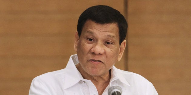 Philippine President Rodrigo Duterte gestures as he speaks during a press conference in Davao City, in the southern island of Mindanao on Feb. 9, 2018.