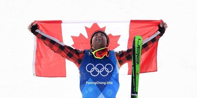 Gold medallist Canada's Brady Leman celebrates during the victory ceremony after the men's ski crossfinal.