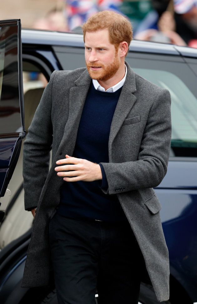 Prince Harry visits Edinburgh Castle on Feb. 13 wearing a Club Monaco coat.