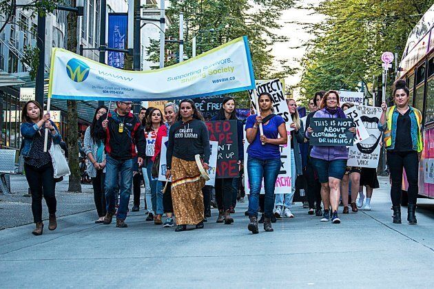 WAVAW Rape Crisis Centre representatives march in Vancouver.