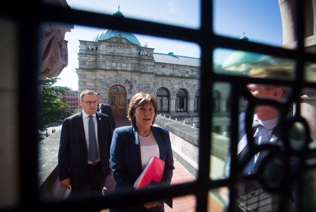 Now-former British Columbia Premier Christy Clark walks from her office to attend a confidence vote in Victoria, B.C., on June 29, 2017.