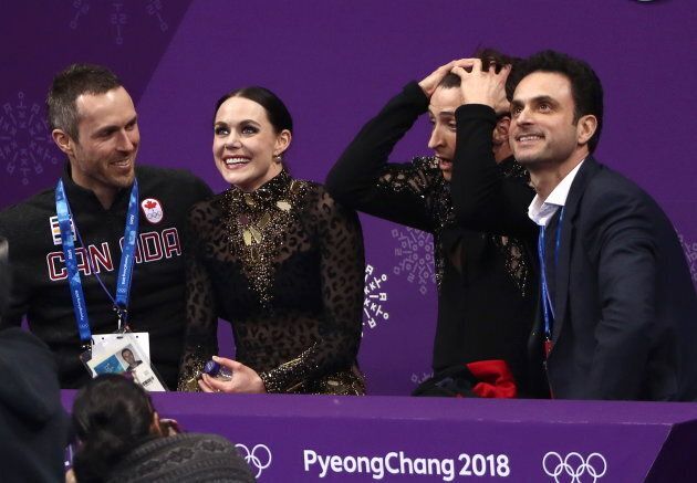 Tessa Virtue and Scott Moir find out their score after performing their short dance during at the 2018 Winter Olympic Games.