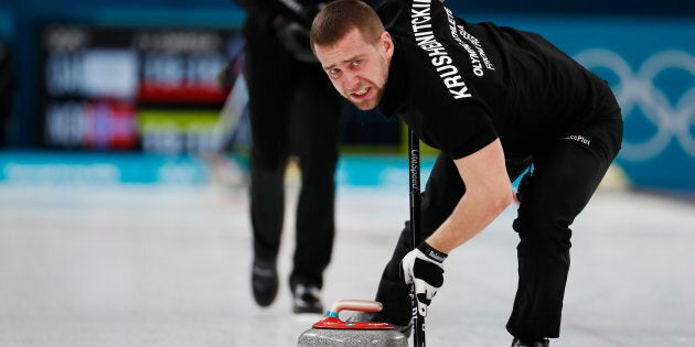 Alexander Krushelnitsky, an Olympic athlete from Russia, sweeps on Feb. 13, 2018.