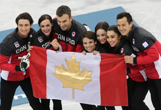 Gold medalists Team Canada (Patrick Chan, Gabrielle Daleman, Kaetlyn Osmond, Meaghan Duhamel, Eric Radford, Tessa Virtue, Scott Moir) after the figure skating team event at the 2018 Games.