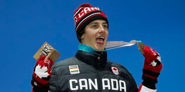 Bronze medallist Mark McMorris of Canada on the men's slopestyle podium at the Pyeongchang 2018 Winter Olympics, on Feb. 11, 2018 .