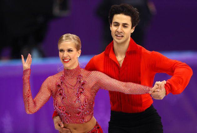Kaitlyn Weaver and Andrew Poje of Canada compete during the figure skating ice dance short dance.
