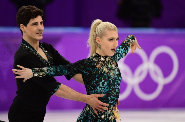 Piper Gilles and Paul Poirier compete in the ice dance short dance of the figure skating event.