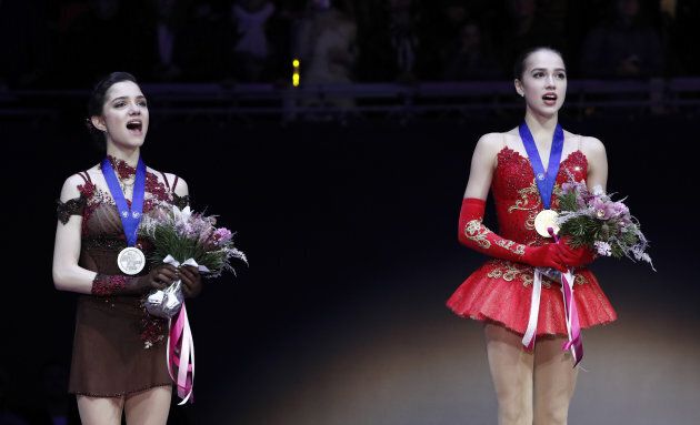 Gold medallist Alina Zagitova of Russia (R) and silver medallist Evgenia Medvedeva of Russia attend the ceremony ISU European Championships 2018 victory ceremony.