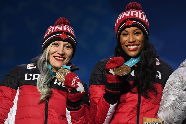 Bronze medalists Kaillie Humphries and Phylicia George of Canada celebrate during the medal ceremony for Bobsleigh - Women on day 13 of the PyeongChang 2018 Winter Olympic Games on Feb. 22, 2018