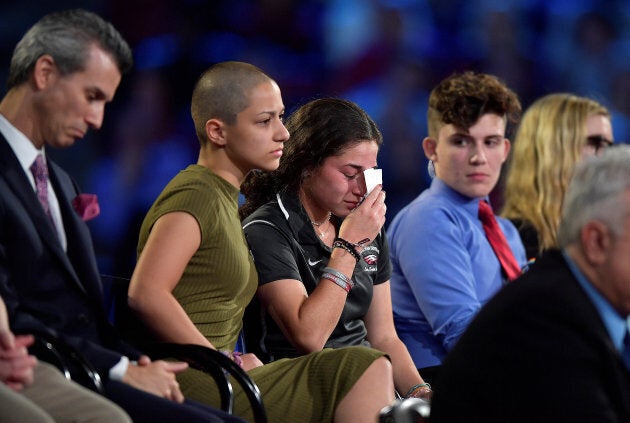 Marjory Stoneman Douglas High School student Emma Gonzalez comforts a classmate during a CNN town hall meeting in Sunrise, Florida, on Feb. 21, 2018.