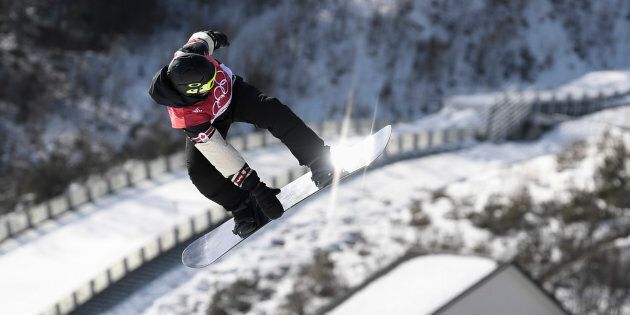 Canada's Sebastien Toutant competes during the qualification of the men's snowboard big air event.