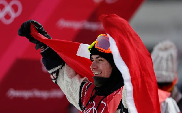 Canada's Sebastien Toutant celebrates winning the gold medal during the men's big air final.