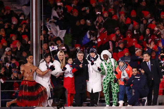 President of the International Olympic Committee Thomas Bach and Lee Hee-beom, President & CEO of Pyeongchang Organizing Committee stand on the stage with Lindsey Vonn of the U.S, Pita Taufatofua of Tonga and other Olympic athletes during the closing ceremony of the Pyeongchang 2018 Winter Olympic Games at Pyeongchang Olympic Stadium on Feb. 25, 2018.