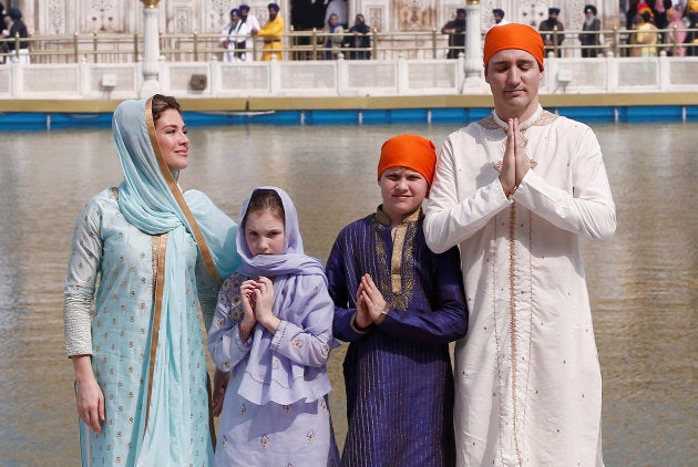 Canadian Prime Minister Justin Trudeau, his wife Sophie Gregoire, daughter Ella Grace and son Xavier pose for photographers during their visit to the holy Sikh shrine of Golden temple in Amritsar, India on Feb. 21, 2018.