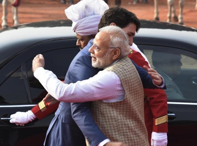 Canadian Prime Minister Justin Trudeau hugs PM Narendra Modi at the ceremonial reception at Rashtrapati Bhawan on Feb. 23, 2018 in New Delhi, India.