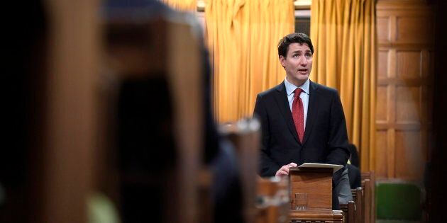 Prime Minister Justin Trudeau looks towards the gallery in the Houes of Commons, where the family of Colten Boushie watch as he delivers a speech on the recognition and implementation of Indigenous rights on Feb. 14, 2018.