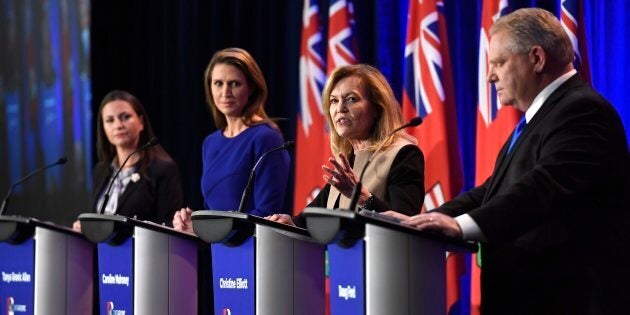 Ontario PC leadership candidate Christine Elliott speaks as candidates Tanya Granic Allen, left, Caroline Mulroney and Doug Ford participate in a debate in Ottawa on Wednesday.