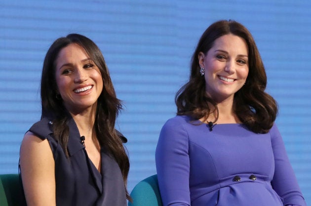 Meghan Markle and the Duchess of Cambridge speak at the Royal Foundation Forum.