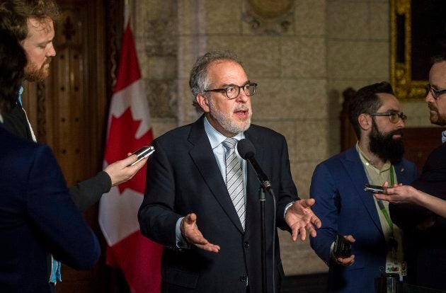 Former Bloc Quebecois MP Rheal Fortin speaks to reporters in the foyer of the House of Commons on Feb. 28, 2018.