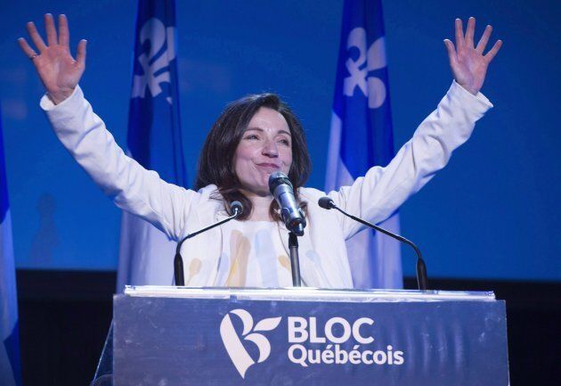 Bloc Quebecois leader Martine Ouellet salutes supporters during a rally on March 18, 2017 in Montreal.