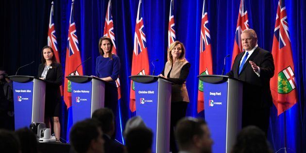 Ontario PC leadership candidate Doug Ford speaks as candidates Tanya Granic Allen, left, Caroline Mulroney and Christine Elliott participate in a debate in Ottawa on Feb. 28, 2018.
