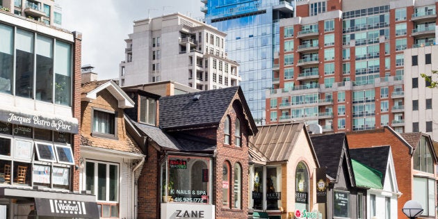 Buildings on Cumberland Street in Toronto's Yorkville neighbourhood, with condo towers in the background. The once-unstoppable juggernaut that was Greater Toronto's housing market has slowed to a crawl.