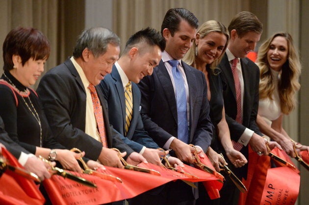 Dignitaries including Malaysian tycoon Tony Tiah (second from left), his son, developer Joo Kim Tiah (third from left) Donald Trump Jr., his wife Vanessa Trump, Eric Trump and his wife Lara Trump cut the ceremonial ribbon at the grand opening of the Trump International Hotel and Tower in Vancouver, B.C., on Tuesday, Feb.28 2017.