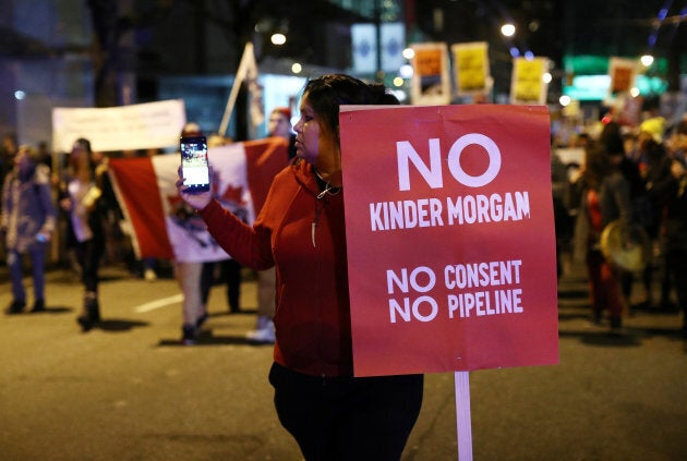 Protesters gather to voice their opposition to Canada's decision to approve Kinder Morgan's pipeline from the Alberta oil sands to the Pacific coast in Vancouver, B.C., Nov. 29, 2016.