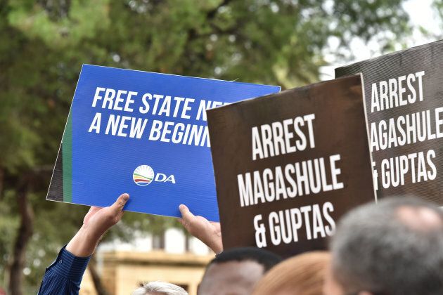 Political activists demonstrate in front of the Bloemfontein Regional Court on Feb. 15, 2018.