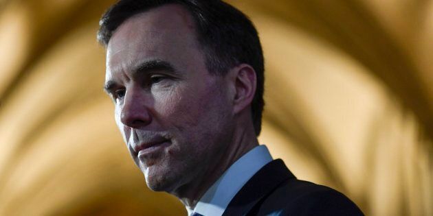 Finance Minister Bill Morneau participates in a TV interview after tabling the budget in the House of Commons on Parliament Hill in Ottawa on Feb. 27, 2018.