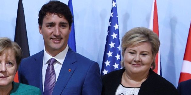 Prime Minister Justin Trudeau, left, and Norway's Prime Minister Erna Solberg, right, attend the