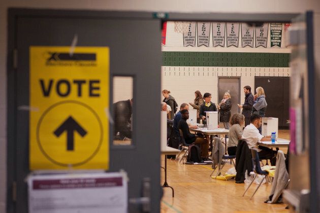 Voters cast ballots on election day in Toronto on Oct. 19, 2015.