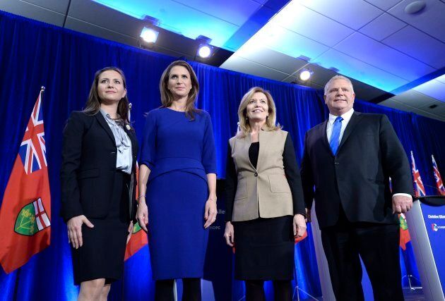 Ontario PC leadership candidates Tanya Granic Allen, Caroline Mulroney, Christine Elliott and Doug Ford pose for a photo after participating in a debate in Ottawa on Feb. 28, 2018.
