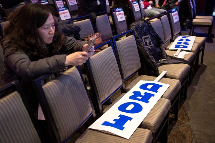 A Doug Ford supporter waits for the announcement of the Ontario PC leadership.