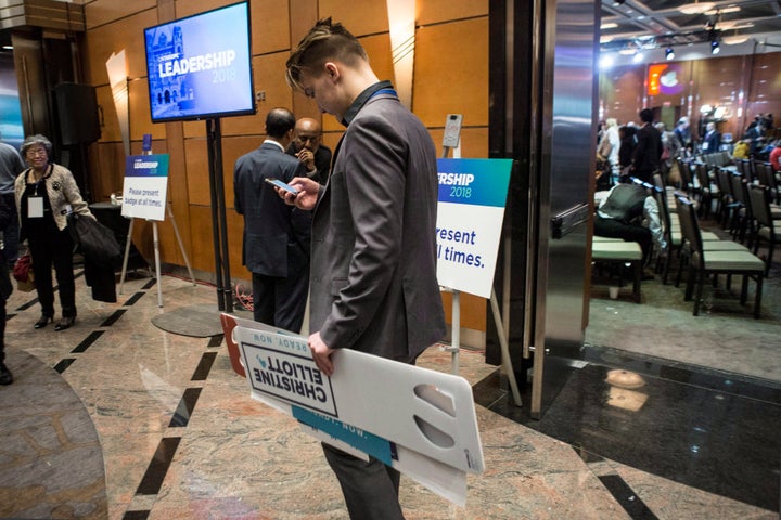 A Christine Elliott supporter leaves the convention hall.