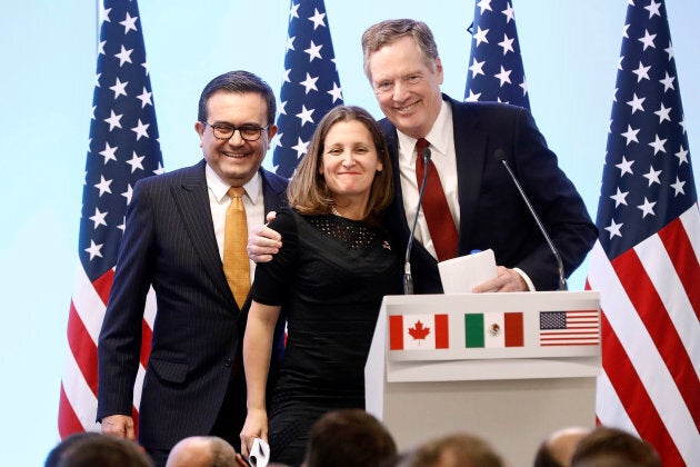 Mexican Economy Minister Ildefonso Guajardo, Canadian Foreign Minister Chrystia Freeland and U.S. Trade Representative Robert Lighthizer smile during a joint news conference on the closing of the seventh round of NAFTA talks in Mexico City, Mexico on March 5, 2018.
