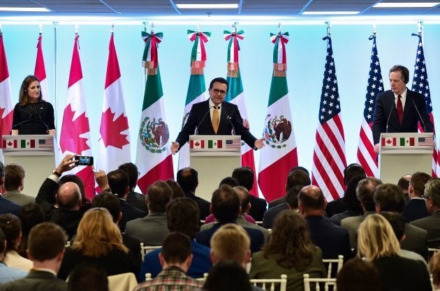 Canadian Minister of Foreign Affairs, Chrystia Freeland, Mexican Economy Minister Idelfonso Guajardo and US Trade Representative Robert Lighthizer give a message to the media during the seventh round of NAFTA negotiations on March 5, 2018.