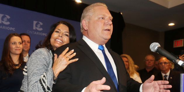 Ontario Progressive Conservative Leader Doug Ford speaks with his wife Karla in Markham, Ont. on March 10, 2018.