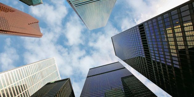 Buildings in Toronto's financial district, including the headquarters of Scotiabank, Bank of Montreal, CIBC and RBC. Moody's Investor Service is warning about the quality of Canadian bank lending, amid a jump in lengthy car loans and uninsured mortgages.