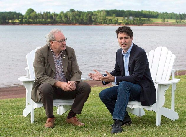 Prime Minister Justin Trudeau chats with Premier Wade MacLauchlan in Cardigan, P.E.I. on June 29, 2017.