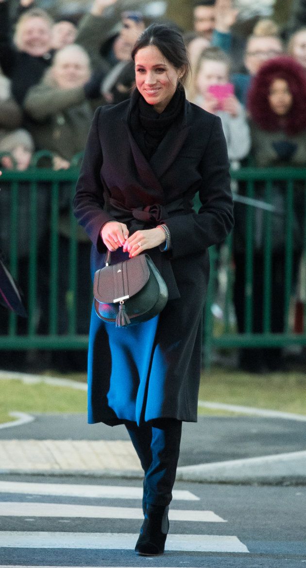 Meghan Markle wears a Stella McCartney coat while visiting Cardiff Castle, Wales, on Jan. 18, 2018.