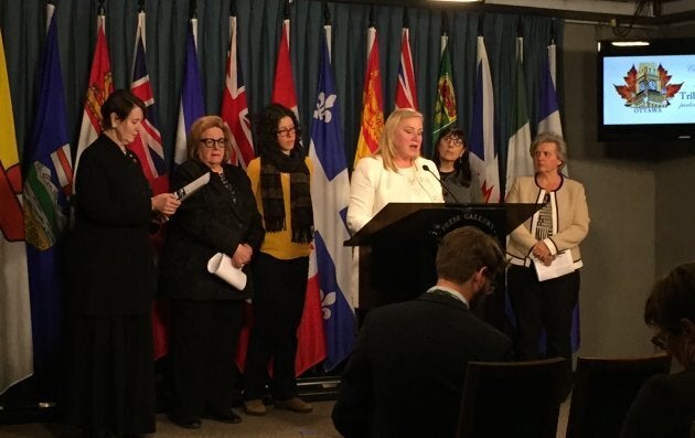 Representatives for Coalition for Gun Control hold a press conference on Parliament Hill on March 20, 2018.