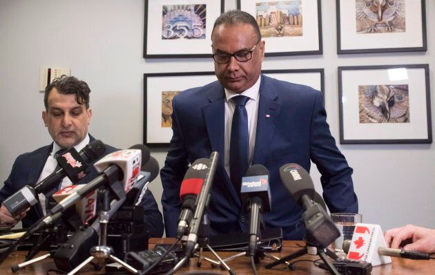 Jaspal Atwal, right, arrives with his lawyer Rishi T. Gill for a news conference in downtown Vancouver on March 8, 2018.