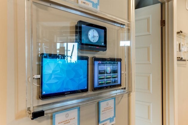 A power monitor is displayed inside a zero-energy home in Guelph, Ont.